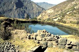 A reservoir in Huaynacotas stores springwater that accumulates overnight.