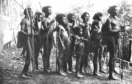 Natives of the Arfak Mountains: These natives never leave their huts without carrying their bows and arrows. Hunting is one of the favorite occupations of the men.